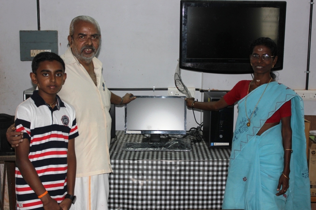 MKN Nair and his grandson Aravind at Government Hight School Chottanikkara while donating Intel based Hewlett Packard Computers for the School Computer Lab